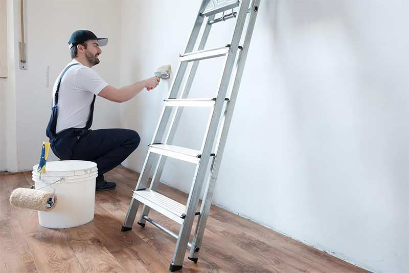 Painter painting residential interior